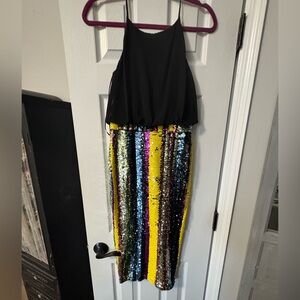 Traffic People Black Dress with colored sequence detail.